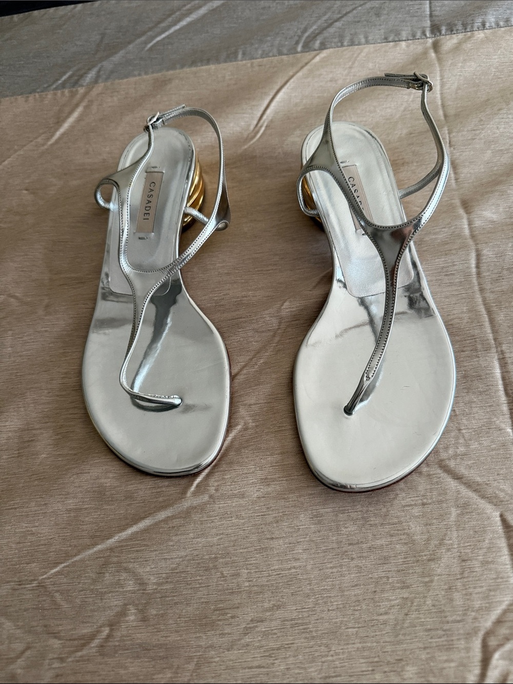 Casadei Silver T-Strap Sandals with Gold Circular Heel